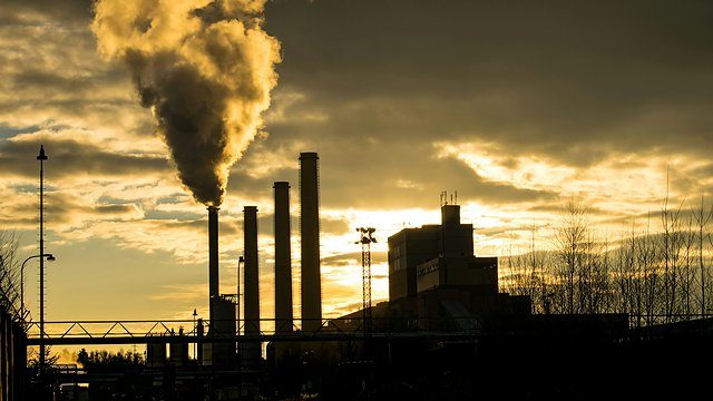 Power plant silhouette dusk