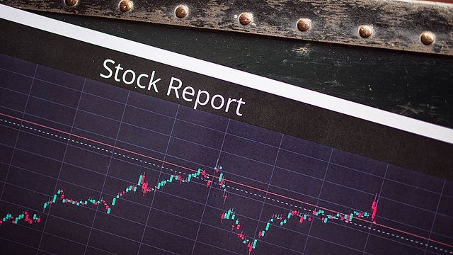 Consumerism stock report tablet closeup