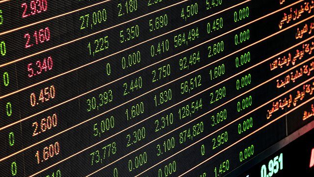 Consumerism stock ticker board closeup
