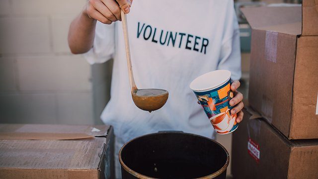 Volunteer ladle soup