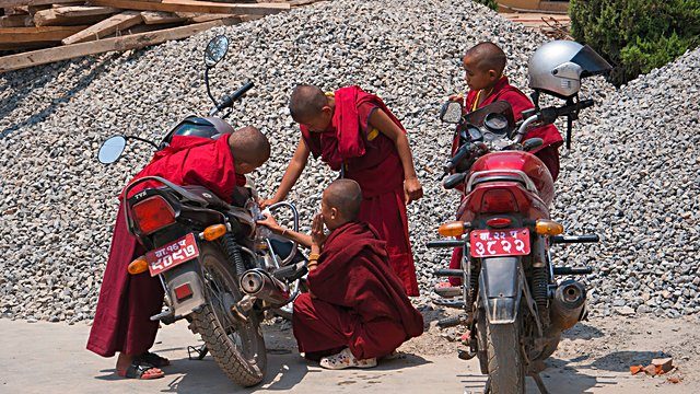 Young monks motorcycles repair