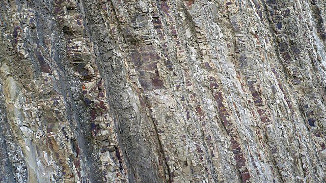 Tilted strata canyon wall
