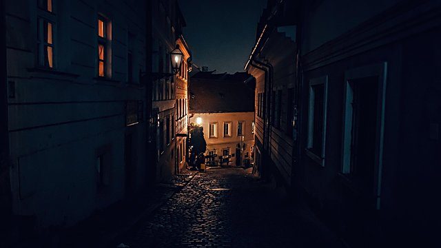 Old town street lit window night