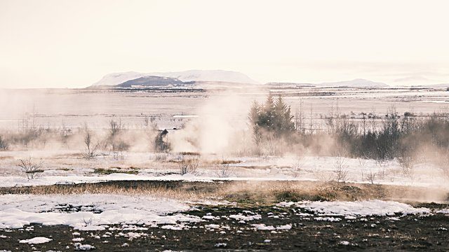 Geothermal steam snowy plain