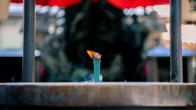Incense bundle red bokeh