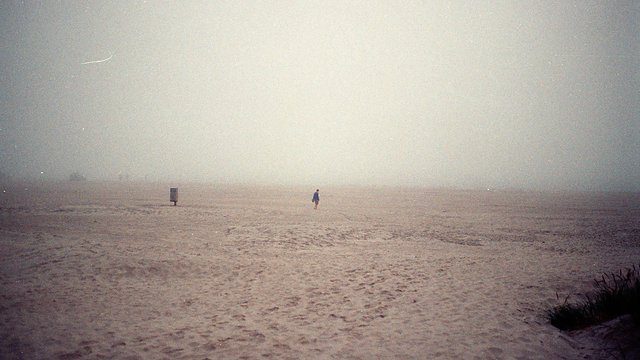 Grainy solitary figure fog