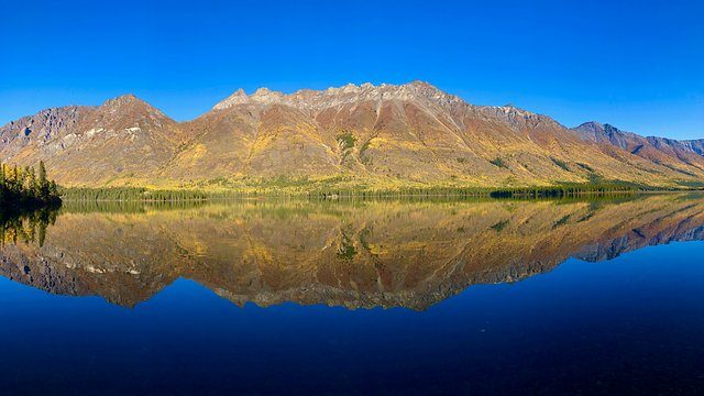 Autumn mountain lake reflection