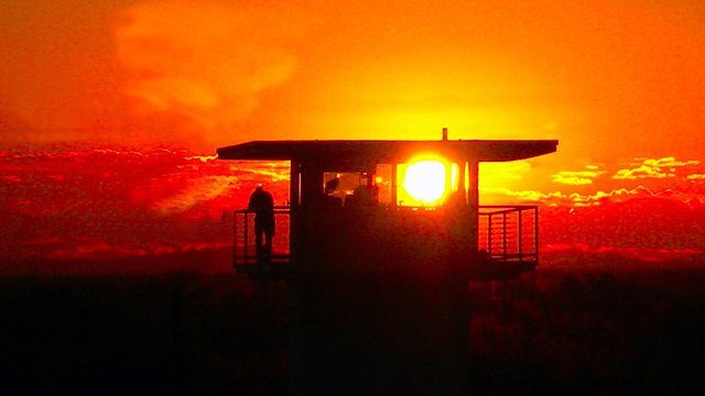 Noisy red watchtower