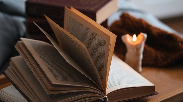 Open book candle table